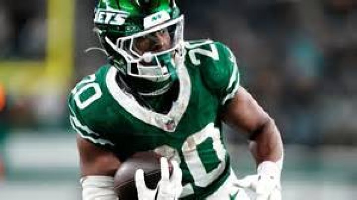 Running Back Breece Hall Makes NFL Draft List- His Father And Mother Proud Of His Career